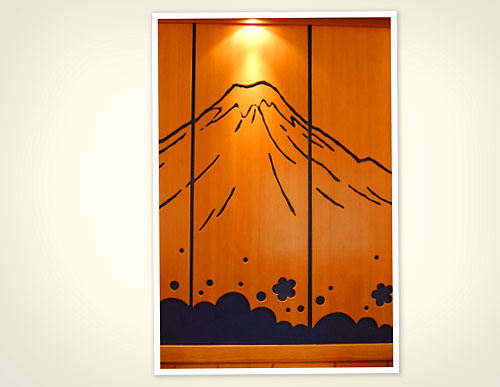 Our wooden mural of Mt Fuji is a relaxing backdrop to our private dining room.