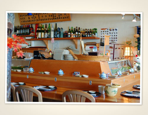 Our wooden sushi bar and selection of drinks.